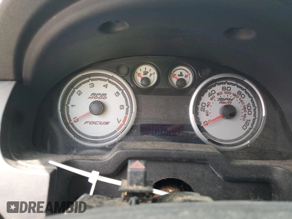 2008 Ford Focus SE z VIN 1FAHP35N18W272057, wystawiony jako Copart lot #59867425 z przebiegiem 293 894 mil mil oraz Szkoda całkowita • Salvage title. Historia ofert i sprzedaży dostępna na DreamBid. Obrazek 9.