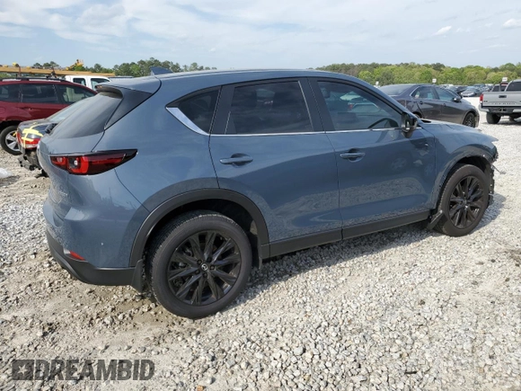 2024 Mazda CX-5 S Carbon Edition z VIN JM3KFBCL5R0493025, wystawiony jako Copart lot #52596785 z przebiegiem 12 360 mil mil oraz Szkoda całkowita • Salvage title. Historia ofert i sprzedaży dostępna na DreamBid. Obrazek 3.