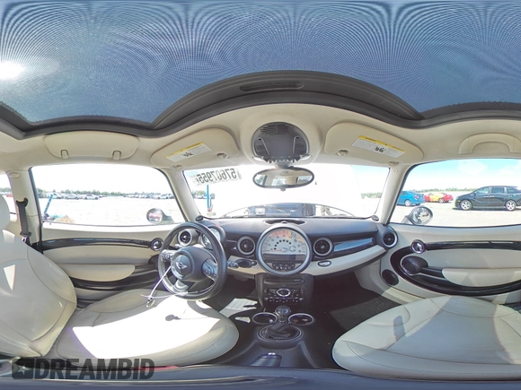 2011 MINI Hardtop with VIN WMWSU3C5XBTX96048, listed as a Copart auction lot 57607955 with 99,632 mi miles and Salvage title. Bid and sale history available at DreamBid. Image 14.