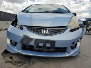 2010 Honda Fit Sport with VIN JHMGE8H64AC032634, listed as a Copart auction lot 61795825 with 143,593 mi miles and Salvage title. Bid and sale history available at DreamBid. Image 5.