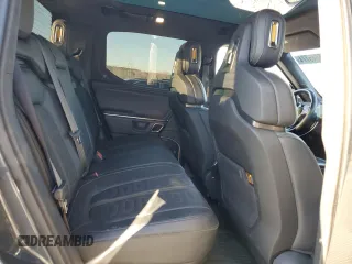 2023 Rivian R1T Adventure z VIN 7FCTGAAA1PN022134, wystawiony jako Copart lot #85545774 z przebiegiem 48 951 mil mil oraz Szkoda całkowita • Salvage title. Historia ofert i sprzedaży dostępna na DreamBid. Obrazek 10.