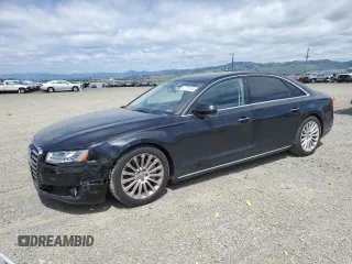 2015 Audi A8 4.0T z VIN WAU32AFD1FN012156, wystawiony jako Copart lot #52759185 z przebiegiem 117 498 mil mil oraz Szkody całkowita. Historia ofert i sprzedaży dostępna na DreamBid. Obrazek 1.