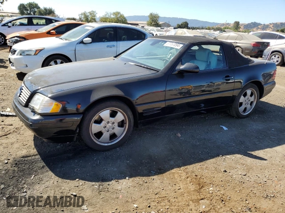 1999 Mercedes-Benz SL-Class with VIN WDBFA68F8XF186072, listed as a Copart auction lot 69557094 with 99,691 mi miles and Salvage Title. Bid and sale history available at carsss.com. Image 1.