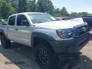 2013 Toyota Tacoma PreRunner z VIN 5TFJU4GN3DX040040, wystawiony jako IAAI lot #42138775 z przebiegiem 197 960 mil mil oraz . Historia ofert i sprzedaży dostępna na DreamBid. Obrazek 1.