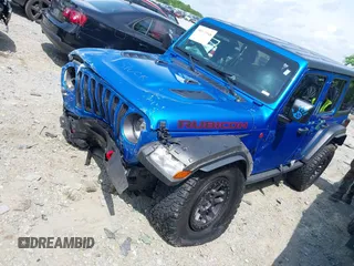 2021 Jeep Wrangler Unlimited Rubicon with VIN 1C4JJXFG3MW833275, listed as a IAAI auction lot 39371948 with 43,428 mi miles. Bid and sale history available at carsss.com. Image 17.