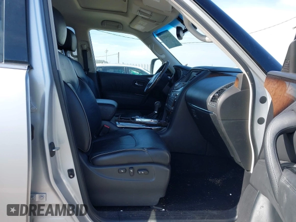 2012 Infiniti QX56 7-passenger with VIN JN8AZ2NF9C9517238, listed as a IAAI auction lot 42040522 with 165,088 mi miles. Bid and sale history available at carsss.com. Image 5.