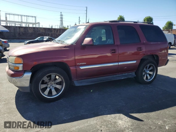2003 GMC Yukon SLT z VIN 1GKEC13T53J319647, wystawiony jako Copart lot #49014225 z przebiegiem 298 601 mil mil oraz Czysty tytuł • Clean title. Historia ofert i sprzedaży dostępna na DreamBid. Obrazek 1.