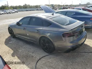 2022 Audi RS 5 Sportback z VIN WUAAWCF57NA901250, wystawiony jako Copart lot #77305584 z przebiegiem Nie podano mil oraz Nie do naprawy. Historia ofert i sprzedaży dostępna na DreamBid. Obrazek 2.
