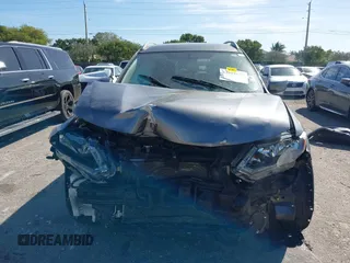 2016 Nissan Rogue S with VIN JN8AT2MT1GW017218, listed as a IAAI auction lot 41739158 with 116,455 mi miles and . Bid and sale history available at DreamBid. Image 13.