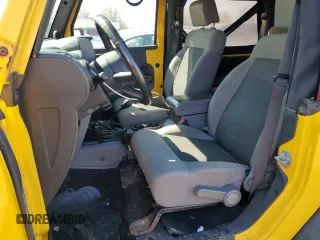 2008 Jeep Wrangler X with VIN 1J4FA24148L555401, listed as a Copart auction lot 50293555 with 155,022 mi miles and Salvage Title. Bid and sale history available at DreamBid. Image 7.