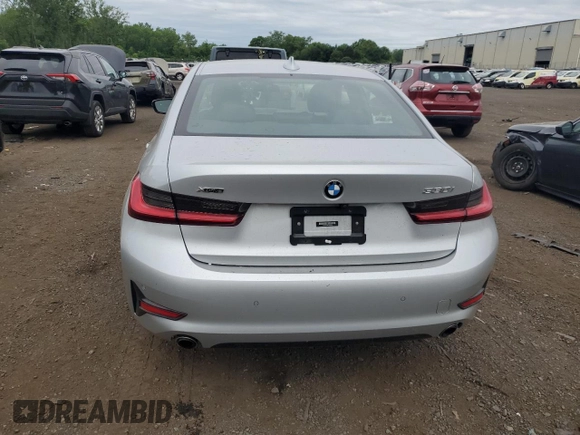 2021 BMW 3 Series 330i xDrive with VIN WBA5R7C0XMFK36218, listed as a Copart auction lot 62274005 with 47,467 mi miles and Salvage title. Bid and sale history available at DreamBid. Image 6.