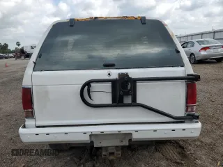1994 GMC Jimmy Diamond Edition Luxury z VIN 1GKDT13W5R2503916, wystawiony jako Copart lot #54717215 z przebiegiem 99 991 mil mil oraz Szkody całkowita. Historia ofert i sprzedaży dostępna na DreamBid. Obrazek 6.