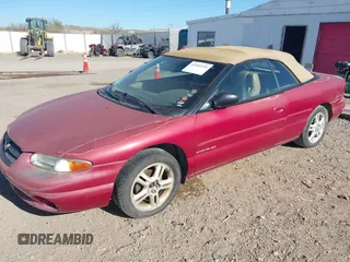 1996 Chrysler Sebring JXi with VIN 3C3EL55H0TT324666, listed as a IAAI auction lot 42102226 with 114,755 mi miles and . Bid and sale history available at DreamBid. Image 2.