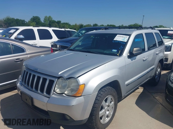 2010 Jeep Grand Cherokee Laredo with VIN 1J4PR4GK1AC143780, listed as a IAAI auction lot 42058575 with 88,608 mi miles. Bid and sale history available at carsss.com. Image 6.