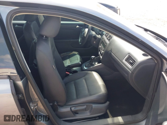2012 Volkswagen Jetta SE z VIN 3VWDX7AJ3CM350041, wystawiony jako IAAI lot #42425022 z przebiegiem 243 840 mil mil oraz . Historia ofert i sprzedaży dostępna na DreamBid. Obrazek 5.