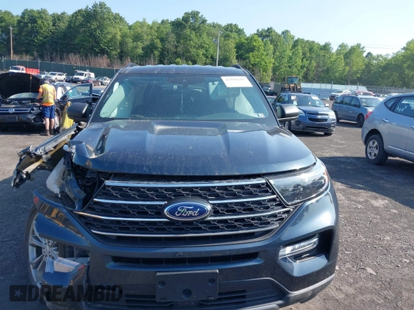 2023 Ford Explorer XLT z VIN 1FMSK8DH5PGB43539, wystawiony jako IAAI lot #42558283 z przebiegiem 16 495 mil mil oraz . Historia ofert i sprzedaży dostępna na DreamBid. Obrazek 12.
