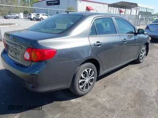 2010 Toyota Corolla with VIN 2T1BU4EE0AC371711, listed as a IAAI auction lot 41784869 with 82,999 mi miles. Bid and sale history available at carsss.com. Image 4.