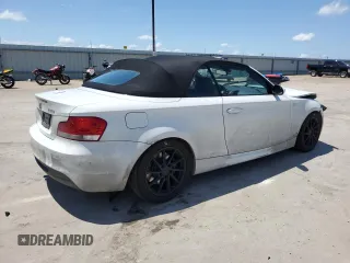 2009 BMW 1 Series 135i with VIN WBAUN93599VK40210, listed as a Copart auction lot 54166905 with 148,899 mi miles and Salvage title. Bid and sale history available at DreamBid. Image 3.