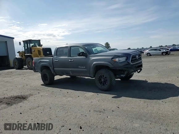2017 Toyota Tacoma SR5 z VIN 3TMCZ5AN7HM094624, wystawiony jako Copart lot #58166405 z przebiegiem 84 877 mil mil oraz Szkoda całkowita • Salvage title. Historia ofert i sprzedaży dostępna na DreamBid. Obrazek 13.