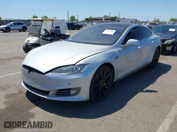 2013 Tesla Model S with VIN 5YJSA1CN5DFP11381, listed as a IAAI auction lot 42087803 with 146,818 mi miles and . Bid and sale history available at DreamBid. Image 18.