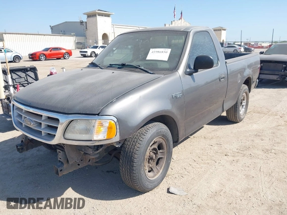 2003 Ford F-150 XL with VIN 1FTRF17273NB64646, listed as a IAAI auction lot 41986850 with 180,601 mi miles and . Bid and sale history available at DreamBid. Image 2.