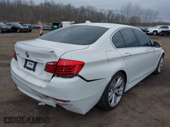 2014 BMW 5 Series 535i xDrive with VIN WBA5B3C57ED537549, listed as a IAAI auction lot 41047583 with 69,005 mi miles and . Bid and sale history available at carsss.com. Image 6.