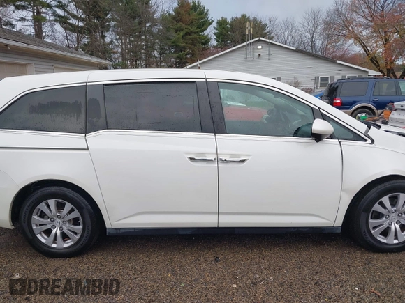 2016 Honda Odyssey EX-L z VIN 5FNRL5H63GB090003, wystawiony jako IAAI lot #40966761 z przebiegiem 67 971 mil mil oraz . Historia ofert i sprzedaży dostępna na DreamBid. Obrazek 13.
