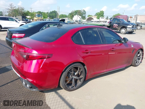 2023 Alfa Romeo Giulia Quadrifoglio with VIN ZARFAMEVXP7671394, listed as a IAAI auction lot 42758075 with Not provided miles and . Bid and sale history available at DreamBid. Image 4.