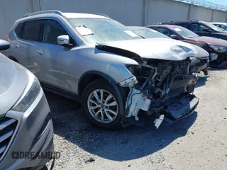 2017 Nissan Rogue S with VIN 5N1AT2MT5HC774584, listed as a IAAI auction lot 42407779 with 123,611 mi miles and . Bid and sale history available at DreamBid. Image 1.
