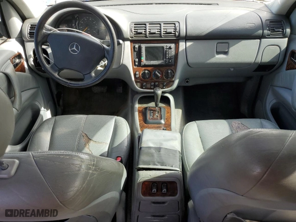 2000 Mercedes-Benz M-Class with VIN 4JGAB54E2YA214989, listed as a Copart auction lot 50450055 with 218,253 mi miles and Non Repairable. Bid and sale history available at carsss.com. Image 8.