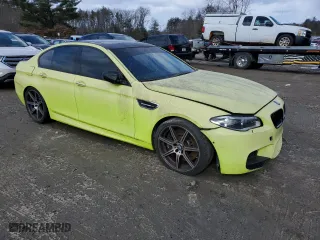 2015 BMW M5 with VIN WBSFV9C58FD594385, listed as a Copart auction lot 44935434 with 74,509 mi miles. Bid and sale history available at carsss.com. Image 4.