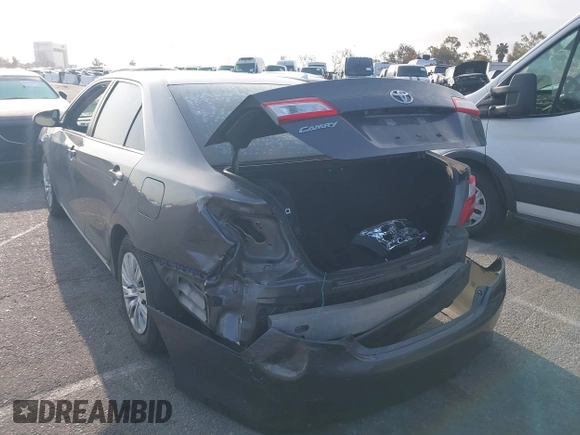 2014 Toyota Camry L with VIN 4T4BF1FK7ER430132, listed as a IAAI auction lot 41912773 with 215,073 mi miles. Bid and sale history available at carsss.com. Image 3.