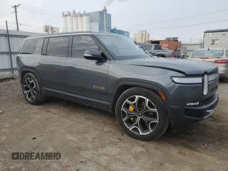 2023 Rivian R1S Launch Edition with VIN 7PDSGABL9PN006743, listed as a Copart auction lot 87275114 with Not Provided miles and Salvage Title. Bid and sale history available at DreamBid. Image 4.