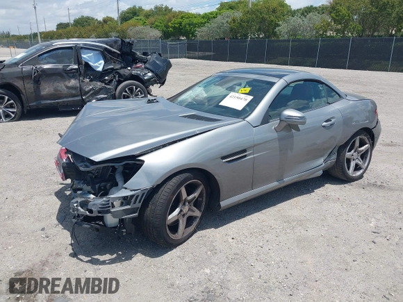 2014 Mercedes-Benz SLK 250 with VIN WDDPK4HA7EF092618, listed as a IAAI auction lot 42150470 with 52,727 mi miles and . Bid and sale history available at DreamBid. Image 2.