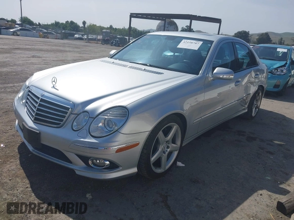 2009 Mercedes-Benz E Luxury 3.5L with VIN WDBUF56XX9B377940, listed as a IAAI auction lot 42158707 with 130,713 mi miles. Bid and sale history available at carsss.com. Image 2.