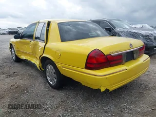 2005 Mercury Grand Marquis LS Premium z VIN 2MHHM75W05X636036, wystawiony jako IAAI lot #41935848 z przebiegiem 182 155 mil mil oraz . Historia ofert i sprzedaży dostępna na DreamBid. Obrazek 3.