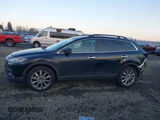 2014 Mazda CX-9 Grand Touring with VIN JM3TB3DV7E0429276, listed as a IAAI auction lot 41415446 with 94,939 mi miles and . Bid and sale history available at DreamBid. Image 15.