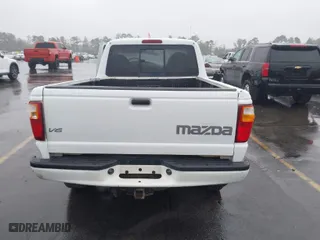 2002 Mazda B-Series 2WD Truck DS with VIN 4F4YR12U82TM11900, listed as a IAAI auction lot 40773356 with 118,353 mi miles. Bid and sale history available at carsss.com. Image 16.