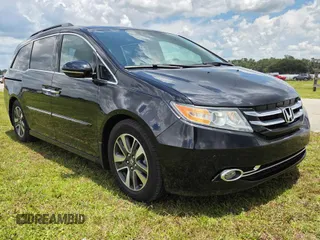2015 Honda Odyssey Touring Elite with VIN 5FNRL5H9XFB077192, listed as a Copart auction lot 66354285 with 153,400 mi miles and Clean title. Bid and sale history available at DreamBid. Image 1.