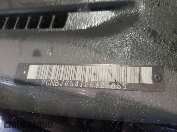 2002 Chevrolet Tracker LT z VIN 2CNBJ634126927635, wystawiony jako Copart lot #78814333 z przebiegiem 224 726 mil mil oraz Szkoda całkowita • Salvage title. Historia ofert i sprzedaży dostępna na DreamBid. Obrazek 13.
