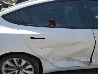 2021 Tesla Model 3 Long Range z VIN 5YJ3E1EB7MF093184, wystawiony jako Copart lot #58060385 z przebiegiem 51 678 mil mil oraz Nie do naprawy • Non repairable. Historia ofert i sprzedaży dostępna na DreamBid. Obrazek 10.