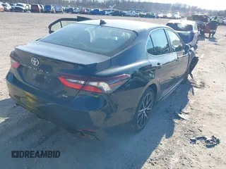 2021 Toyota Camry SE Nightshade with VIN 4T1T11AK6MU402597, listed as a IAAI auction lot 41718894 with Not Provided miles and . Bid and sale history available at carsss.com. Image 4.