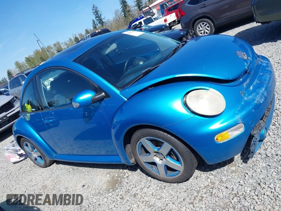 2004 Volkswagen New Beetle Coupe Satellite Blue with VIN 3VWGK31C14M420613, listed as a IAAI auction lot 42046048 with 117,274 mi miles. Bid and sale history available at carsss.com. Image 13.