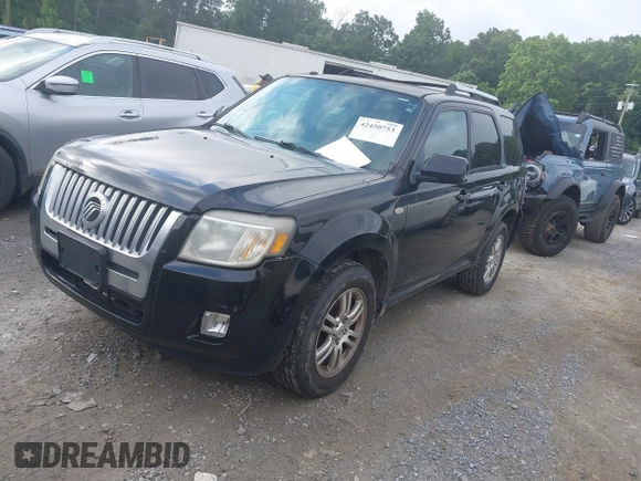 2009 Mercury Mariner Premier with VIN 4M2CU97749KJ15320, listed as a IAAI auction lot 42450753 with 182,172 mi miles and . Bid and sale history available at DreamBid. Image 2.