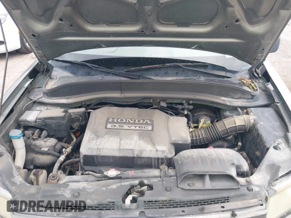 2007 Honda Ridgeline RTL with VIN 2HJYK16517H513832, listed as a IAAI auction lot 42626411 with 209,171 mi miles and . Bid and sale history available at DreamBid. Image 10.