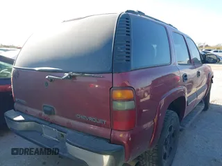 2004 Chevrolet Tahoe LT z VIN 1GNEC13ZX4R166600, wystawiony jako IAAI lot #41728301 z przebiegiem 245 044 mil mil oraz . Historia ofert i sprzedaży dostępna na DreamBid. Obrazek 4.