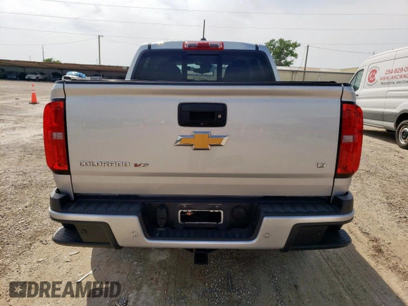 2019 Chevrolet Colorado 2WD LT z VIN 1GCGSCEN9K1350285, wystawiony jako Copart lot #57084305 z przebiegiem 67 001 mil mil oraz Szkoda całkowita • Salvage title. Historia ofert i sprzedaży dostępna na DreamBid. Obrazek 6.