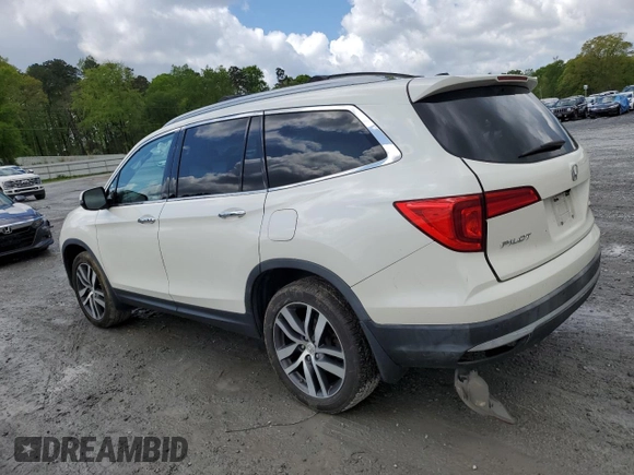 2017 Honda Pilot Touring with VIN 5FNYF6H91HB092062, listed as a Copart auction lot 52761765 with 141,750 mi miles and Salvage Title. Bid and sale history available at DreamBid. Image 2.