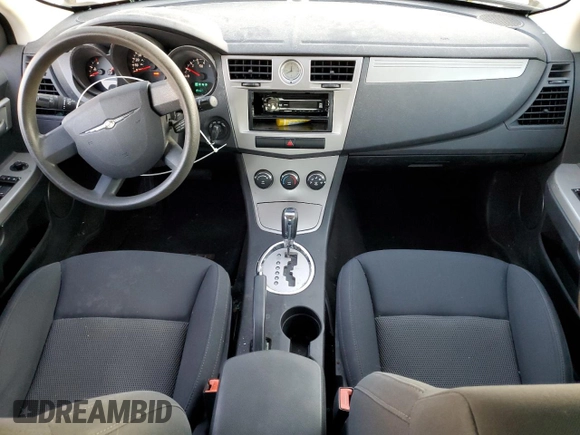 2010 Chrysler Sebring Touring z VIN 1C3CC4FBXAN119459, wystawiony jako Copart lot #47165515 z przebiegiem 125 382 mil mil oraz Szkoda całkowita • Salvage title. Historia ofert i sprzedaży dostępna na DreamBid. Obrazek 8.