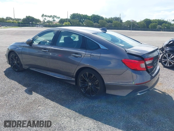 2022 Honda Accord Touring with VIN 1HGCV3F91NA031010, listed as a IAAI auction lot 40302407 with 18,820 mi miles and . Bid and sale history available at DreamBid. Image 3.